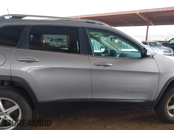 2017 Jeep Cherokee Latitude with VIN 1C4PJMCB4HD213716, listed as a IAAI auction lot 41921391 with 96,885 mi miles and . Bid and sale history available at DreamBid. Image 13.