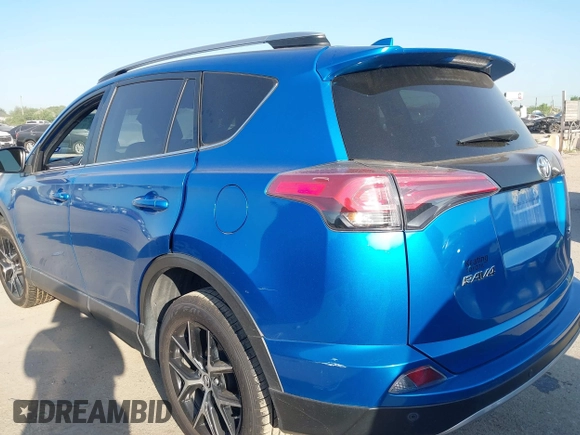 2018 Toyota RAV4 SE with VIN JTMNFREV3JJ156865, listed as a IAAI auction lot 41986697 with 124,979 mi miles and . Bid and sale history available at DreamBid. Image 3.