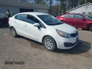 2014 Kia Rio LX with VIN KNADM4A37E6332282, listed as a IAAI auction lot 42050166 with 159,116 mi miles. Bid and sale history available at carsss.com. Image 1.