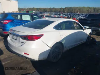 2015 Mazda 6 i Grand Touring with VIN JM1GJ1W54F1202766, listed as a IAAI auction lot 41860197 with Not Provided miles and . Bid and sale history available at DreamBid. Image 4.