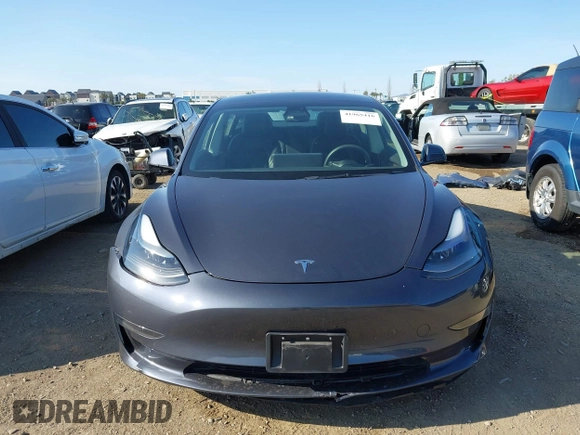 2023 Tesla Model 3 with VIN 5YJ3E1EA7PF447409, listed as a IAAI auction lot 41965416 with 40,033 mi miles and . Bid and sale history available at DreamBid. Image 6.