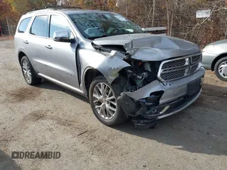 2014 Dodge Durango Citadel z VIN 1C4SDJET5EC509366, wystawiony jako IAAI lot #40735205 z przebiegiem 149 644 mil mil oraz . Historia ofert i sprzedaży dostępna na DreamBid. Obrazek 1.
