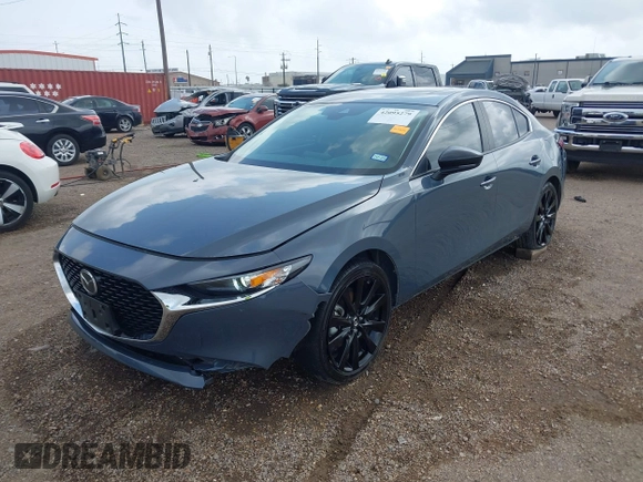 2022 Mazda 3 Carbon Edition z VIN 3MZBPACL7NM313242, wystawiony jako IAAI lot #42095279 z przebiegiem 30 787 mil mil oraz . Historia ofert i sprzedaży dostępna na DreamBid. Obrazek 17.
