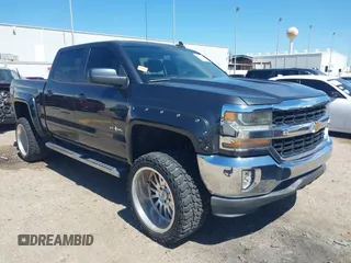 2018 Chevrolet Silverado 1500 LT with VIN 3GCPCREC1JG127396, listed as a IAAI auction lot 41790850 with 138,725 mi miles and . Bid and sale history available at DreamBid. Image 1.
