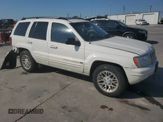 2002 Jeep Grand Cherokee Limited with VIN 1J4GX58N12C282300, listed as a Copart auction lot 74939754 with 166,018 mi miles and Salvage Title. Bid and sale history available at DreamBid. Image 4.
