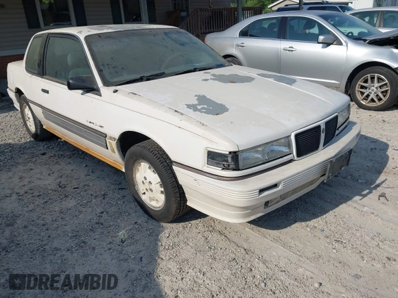 1986 Pontiac Grand Am with VIN 1G2NW27L1GC723322, listed as a IAAI auction lot 42290581 with Not provided miles and . Bid and sale history available at DreamBid. Image 1.