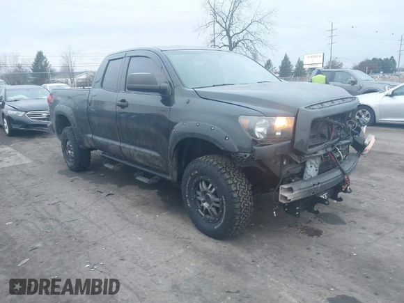 2009 Toyota Tundra 4WD Truck with VIN 5TFBW54119X091419, listed as a IAAI auction lot 41031994 with 214,922 mi miles. Bid and sale history available at carsss.com. Image 1.