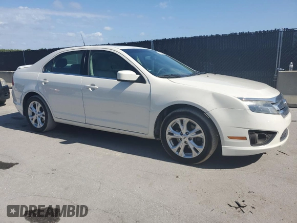 2012 Ford Fusion SE z VIN 3FAHP0HA7CR133859, wystawiony jako Copart lot #61153125 z przebiegiem 100 822 mil mil oraz Czysty tytuł • Clean title. Historia ofert i sprzedaży dostępna na DreamBid. Obrazek 4.
