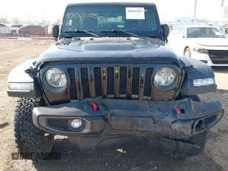 2018 Jeep Wrangler Rubicon z VIN 1C4HJXCG9JW193703, wystawiony jako IAAI lot #42065185 z przebiegiem 61 518 mil mil oraz . Historia ofert i sprzedaży dostępna na DreamBid. Obrazek 6.