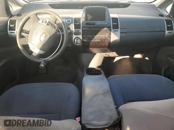 2007 Toyota Prius with VIN JTDKB20U973203107, listed as a Copart auction lot 51057265 with 196,452 mi miles and Salvage Title. Bid and sale history available at DreamBid. Image 8.