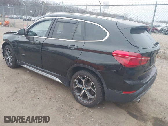 2017 BMW X1 xDrive28i with VIN WBXHT3C31H5F72958, listed as a IAAI auction lot 41782257 with 134,829 mi miles. Bid and sale history available at carsss.com. Image 3.