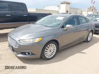 2014 Ford Fusion Titanium with VIN 3FA6P0SU0ER269411, listed as a IAAI auction lot 42163704 with 169,355 mi miles and . Bid and sale history available at DreamBid. Image 2.