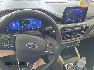 2021 Ford Escape Titanium Hybrid с VIN 1FMCU0DZ6MUA90016, выставлен на аукционе IAAI как лот 42532789 с пробегом 100 914 миль миль и . История ставок и продаж доступна на DreamBid. Изображение 1.