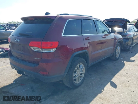 2017 Jeep Grand Cherokee Laredo with VIN 1C4RJEAG4HC674921, listed as a IAAI auction lot 41876971 with 115,773 mi miles. Bid and sale history available at carsss.com. Image 4.
