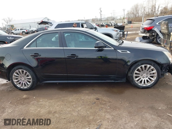 2011 Cadillac CTS Premium with VIN 1G6DS5ED7B0101210, listed as a IAAI auction lot 41802027 with 127,701 mi miles. Bid and sale history available at carsss.com. Image 13.