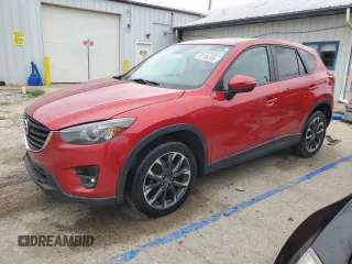 2016 Mazda CX-5 Grand Touring with VIN JM3KE4DY5G0660201, listed as a Copart auction lot 52165205 with 108,231 mi miles and Salvage Title. Bid and sale history available at carsss.com. Image 1.