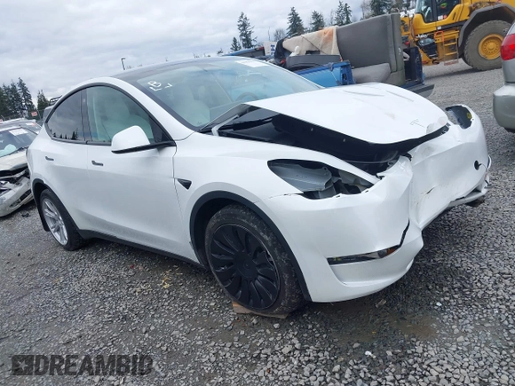 2023 Tesla Model Y Long Range z VIN 7SAYGAEEXPF647352, wystawiony jako IAAI lot #41955933 z przebiegiem Nie podano mil oraz . Historia ofert i sprzedaży dostępna na DreamBid. Obrazek 1.