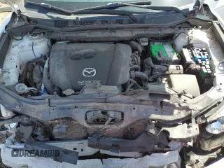 2016 Mazda CX-5 Sport с VIN JM3KE4BY1G0611368, выставлен на аукционе Copart как лот 56979385 с пробегом 106 397 миль миль и Списание • Salvage title. История ставок и продаж доступна на DreamBid. Изображение 12.