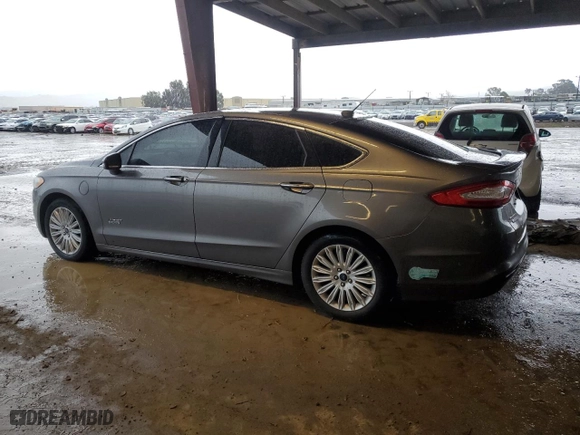 2014 Ford Fusion Energi Titanium with VIN 3FA6P0SU3ER178097, listed as a Copart auction lot 43999655 with 211,675 mi miles and Salvage Title. Bid and sale history available at carsss.com. Image 2.
