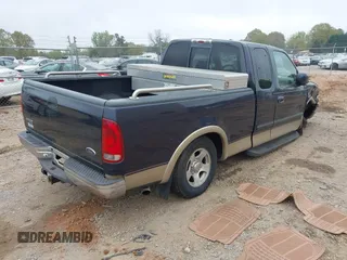 1999 Ford F-150 XL with VIN 1FTRX17L8XNA16906, listed as a IAAI auction lot 41945377 with 249,475 mi miles. Bid and sale history available at carsss.com. Image 4.