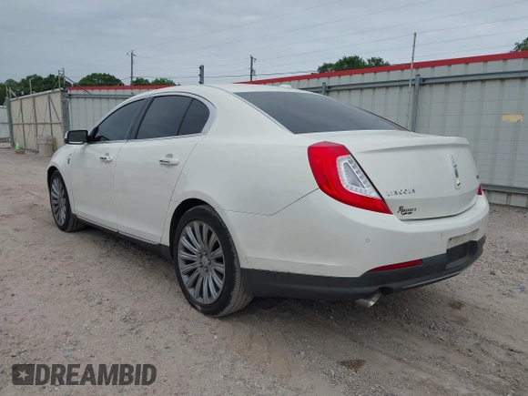 2013 Lincoln MKS with VIN 1LNHL9DKXDG604710, listed as a IAAI auction lot 42001875 with 117,724 mi miles and . Bid and sale history available at DreamBid. Image 3.