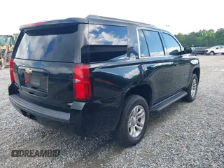2015 Chevrolet Tahoe LS z VIN 1GNSCAKC5FR101933, wystawiony jako IAAI lot #42242415 z przebiegiem 185 191 mil mil oraz . Historia ofert i sprzedaży dostępna na DreamBid. Obrazek 4.