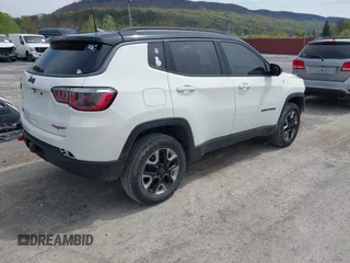 2017 Jeep Compass Trailhawk with VIN 3C4NJDDBXHT500588, listed as a IAAI auction lot 42060556 with 76,788 mi miles and . Bid and sale history available at DreamBid. Image 4.