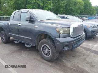 2011 Toyota Tundra with VIN 5TFUY5F16BX178349, listed as a IAAI auction lot 42176248 with 173,271 mi miles and . Bid and sale history available at DreamBid. Image 1.