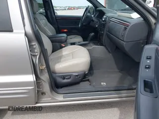 2001 Jeep Grand Cherokee Limited with VIN 1J4GW58N21C655426, listed as a IAAI auction lot 42280177 with 110,207 mi miles and . Bid and sale history available at DreamBid. Image 5.