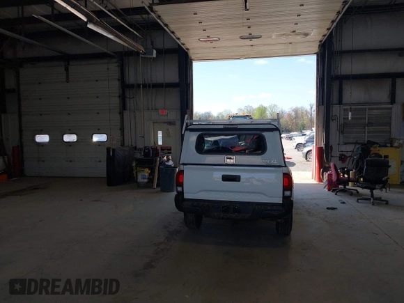 2020 Toyota Tacoma SR with VIN 5TFRX5GN1LX177797, listed as a IAAI auction lot 41882427 with 107,787 mi miles and . Bid and sale history available at DreamBid. Image 17.