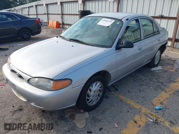 1999 Ford Escort SE z VIN 1FAFP13P6XW200107, wystawiony jako IAAI lot #42600719 z przebiegiem 113 515 mil mil oraz . Historia ofert i sprzedaży dostępna na DreamBid. Obrazek 2.