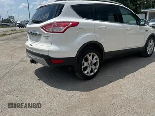 2015 Ford Escape Titanium with VIN 1FMCU9J96FUC83519, listed as a Copart auction lot 65181025 with 199,500 mi miles and Clean title. Bid and sale history available at DreamBid. Image 4.