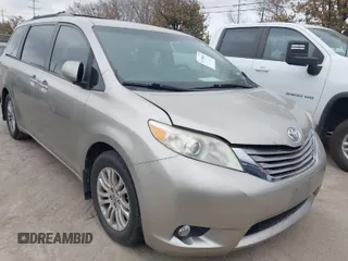 2015 Toyota Sienna XLE with VIN 5TDYK3DC4FS677254, listed as a IAAI auction lot 41708885 with 122,637 mi miles. Bid and sale history available at carsss.com. Image 1.