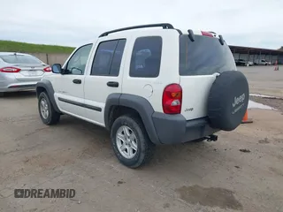 2002 Jeep Liberty Sport with VIN 1J4GL48K92W268896, listed as a IAAI auction lot 41788687 with 102,706 mi miles. Bid and sale history available at carsss.com. Image 3.