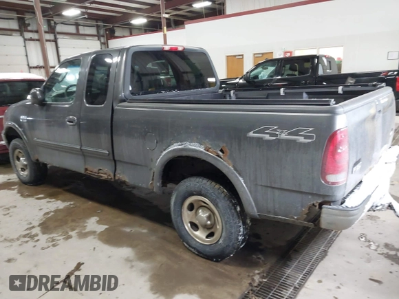 2003 Ford F-150 XL with VIN 1FTRX18W63NB69173, listed as a IAAI auction lot 41618645 with 219,506 mi miles. Bid and sale history available at carsss.com. Image 3.