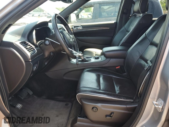 2018 Jeep Grand Cherokee Overland with VIN 1C4RJFCG2JC212947, listed as a Copart auction lot 59503405 with 76,436 mi miles and Clean title. Bid and sale history available at DreamBid. Image 7.
