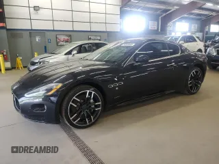 2009 Maserati GranTurismo с VIN ZAMHL45A690047979, выставлен на аукционе Copart как лот 59949845 с пробегом 65 912 миль миль и Чистый • Clean title. История ставок и продаж доступна на DreamBid. Изображение 1.