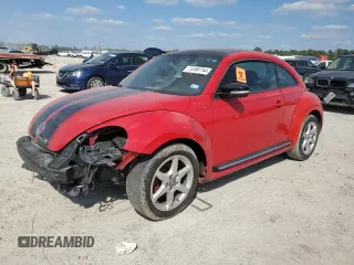 2012 Volkswagen Beetle 2.0T Turbo with VIN 3VWV67AT1CM643025, listed as a Copart auction lot 73380754 with 0 mi miles and Salvage Title. Bid and sale history available at carsss.com. Image 1.