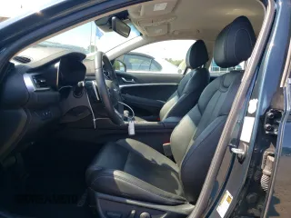 2023 Genesis G70 2.0T with VIN KMTG34TA6PU131696, listed as a Copart auction lot 69596114 with 29,968 mi miles and Salvage Title. Bid and sale history available at DreamBid. Image 7.