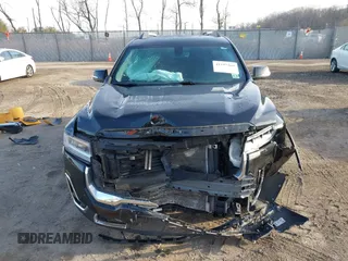 2020 GMC Acadia SLT with VIN 1GKKNMLS8LZ180007, listed as a IAAI auction lot 41197369 with 61,968 mi miles and . Bid and sale history available at DreamBid. Image 12.