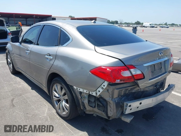 2012 Infiniti M with VIN JN1BY1AR3CM391052, listed as a IAAI auction lot 42178760 with 198,116 mi miles and . Bid and sale history available at DreamBid. Image 3.