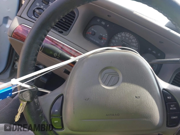 2000 Mercury Grand Marquis LS z VIN 2MEFM75W1YX673105, wystawiony jako IAAI lot #42050980 z przebiegiem 154 944 mil mil oraz . Historia ofert i sprzedaży dostępna na DreamBid. Obrazek 11.