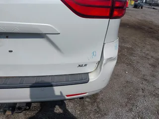 2016 Toyota Sienna XLE with VIN 5TDYK3DC4GS748888, listed as a IAAI auction lot 42605968 with 164,811 mi miles and . Bid and sale history available at DreamBid. Image 20.