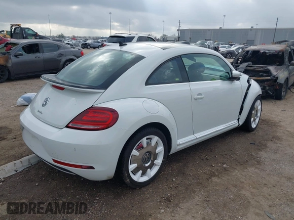 2019 Volkswagen Beetle S with VIN 3VWFD7AT2KM701622, listed as a IAAI auction lot 41520300 with Not provided miles and . Bid and sale history available at DreamBid. Image 4.