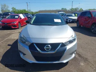 2018 Nissan Maxima SR with VIN 1N4AA6AP3JC374804, listed as a IAAI auction lot 42145406 with 136,757 mi miles. Bid and sale history available at carsss.com. Image 13.