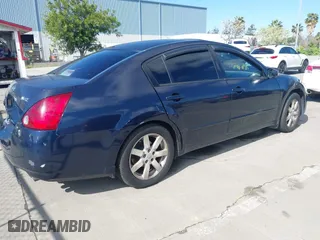 2004 Nissan Maxima SL with VIN 1N4BA41E64C861846, listed as a IAAI auction lot 41911687 with 218,668 mi miles. Bid and sale history available at carsss.com. Image 4.