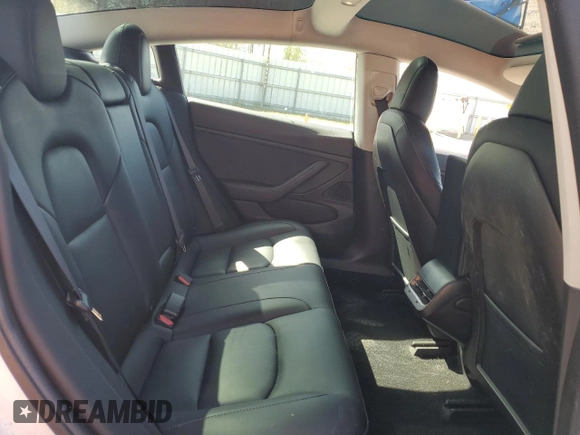 2019 Tesla Model 3 Mid Range with VIN 5YJ3E1EA0KF484178, listed as a Copart auction lot 53121915 with 64,929 mi miles and Salvage Title. Bid and sale history available at DreamBid. Image 10.