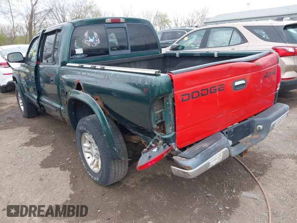 2001 Dodge Dakota Sport z VIN 1B7HG2ANX1S256902, wystawiony jako IAAI lot #42037703 z przebiegiem 121 914 mil mil oraz . Historia ofert i sprzedaży dostępna na DreamBid. Obrazek 6.