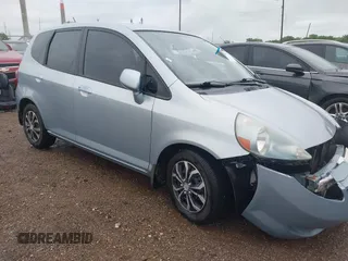 2007 Honda Fit z VIN JHMGD384X7S044600, wystawiony jako IAAI lot #42299463 z przebiegiem 175 096 mil mil oraz . Historia ofert i sprzedaży dostępna na DreamBid. Obrazek 1.