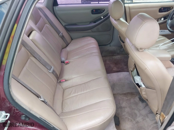 1997 Toyota Avalon XL with VIN 4T1BF12B5VU185685, listed as a IAAI auction lot 42037605 with 150,999 mi miles. Bid and sale history available at carsss.com. Image 8.